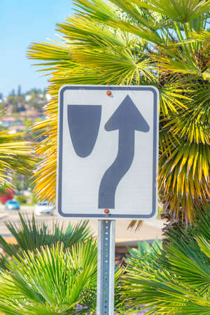 Keep right signage against the green leaves at San Marcos, San Diego, California