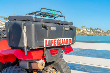 Box at the back of a lifeguard quad bike at San Clemente, Californiaの写真素材