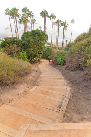 Stairs to the beach with wood steps at San Clemente, Californiaの写真素材