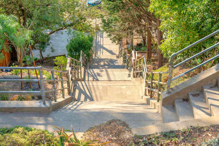 Concrete staircase on a slope at the park in San Francisco, Californiaの写真素材