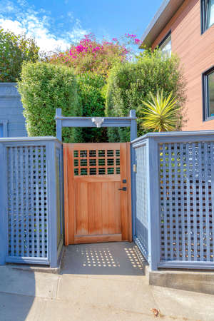 Wooden gate with light blue wooden fence at San Francisco, California