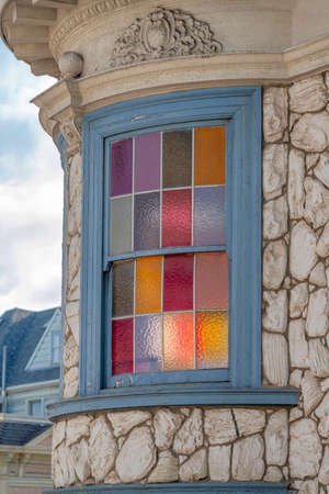 Curved window exterior with colorful glass panes at San Francisco, California