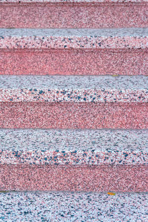 Granite steps of a staircase with red and black colors at San Francisco, Californiaの写真素材