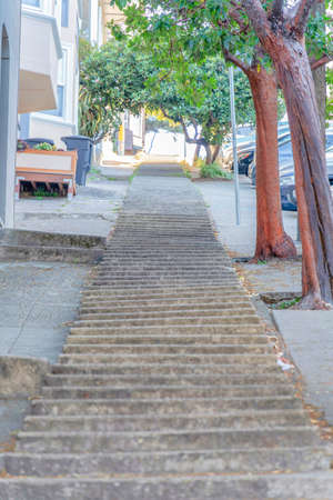 Concrete small steps on a sloped side walk in San Francisco, California