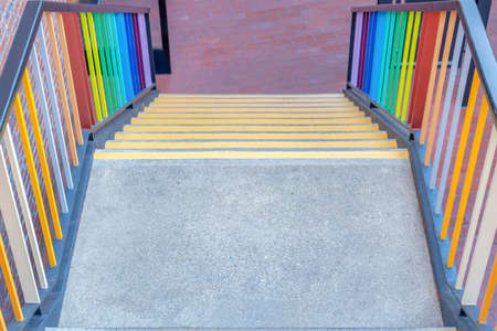Landing in the middle of an outdoor stairs with yellow lines at the steps near the Fishermans Wharf