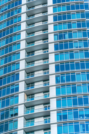 Exterior view of skyscraper in the city of Austin Texas with glass facade. Downtown architecture of...