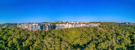 Austin, Texas- Large residential buildings on top of a mountain. Upper middle class residential buildings with balconies near the cliff of the mountain.の写真素材