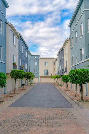 Empty driveway in the middle of residential buildings at Silicon Valley, San Jose, Californiaの写真素材