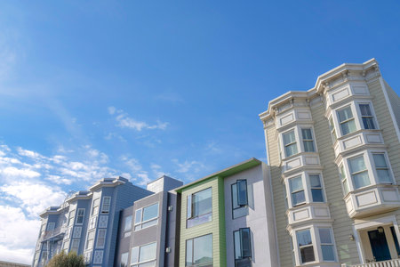 Complex townhomes with traditional and moderndesign in a low angle view. Neighborhood in San...