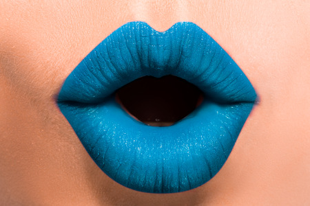 Beautiful female lips close-up.の写真素材