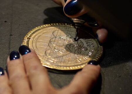 engraver engrave the drawing on the sketch.の写真素材