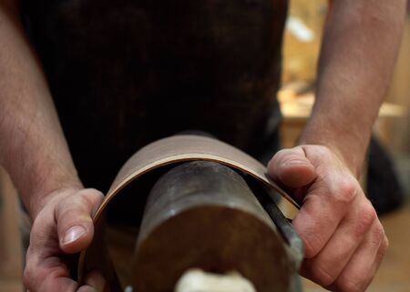 Shape shaping from rosewood for sides of classical guitar.の写真素材