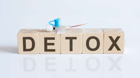 word DETOXon wooden blocks on white backgound. medical conceptの写真素材