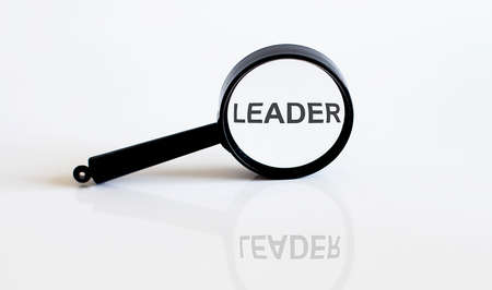 Magnifier with text LEADER on white backgroundの写真素材