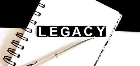 Business text LEGACY on the notepad with penの写真素材