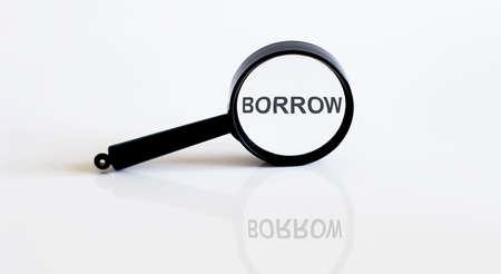Magnifier with text BORROW on white backgroundの写真素材