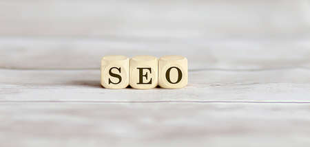 Seo word collected of wooden elements on the wooden background