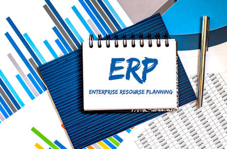 Notebook with Toolls and Notes about ERP, conceptの写真素材