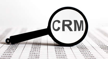 Magnifier with text CRM on chart backgroundの写真素材