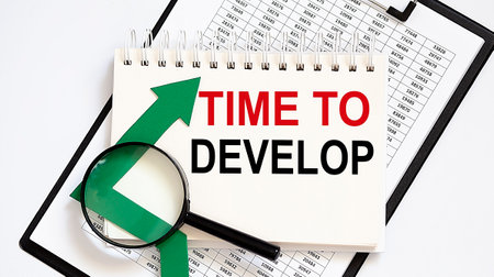 Notebook with Tools and Notes about TIME TO DEVELOP with chart