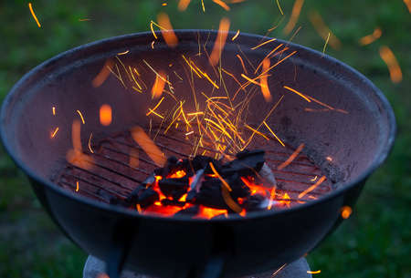 Barbecue grill with fire on nature, outdoor,