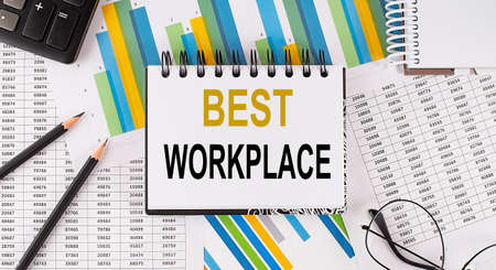 Closeup a notebook with text BEST WORKPLACE, business concept image on the chart backgroundの写真素材