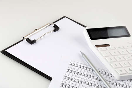Worktable covered with documents and documents