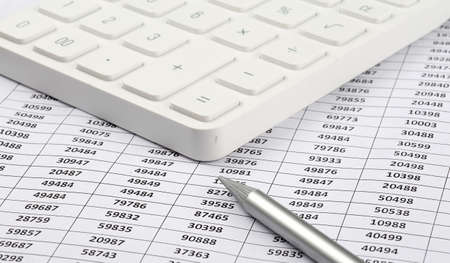 Calculator and pen on chart background. Business concept