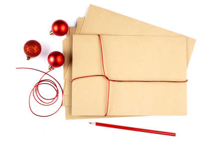 Blank envelope with red balls. Christmas concept. Copy space