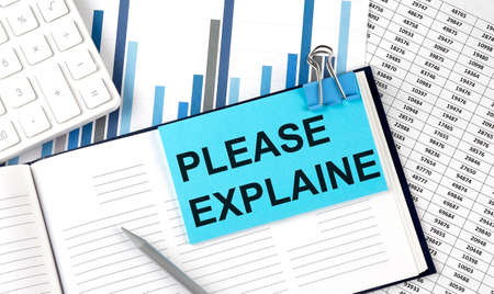 Please Explain Sign PLEASE EXPLAIN text on blue sticker on chart background near calculator ...