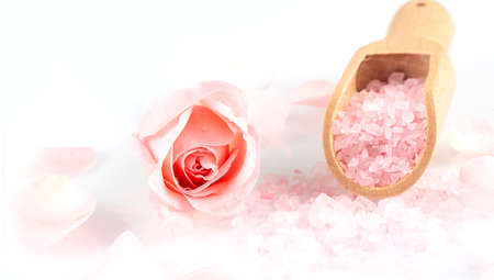 rose salt with rose petals on the white background top view.の写真素材