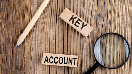 Key account words on wooden building blocks. Personal finances concept.の写真素材
