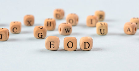 EOD written on wooden cube , business conceptの写真素材
