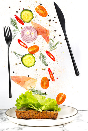 Sandwich for levitation vegetables on a white backgroundの写真素材