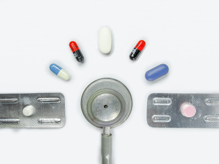 Stethoscope; Medicine; Time clock made with medicine...time to visit doctor,high time,remember to take medicine,time for health checkup,の写真素材