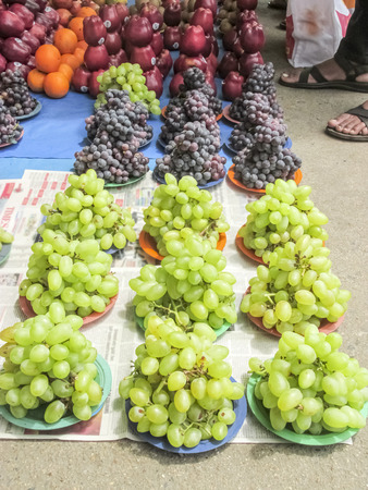 Market place selling of fruits arraneged in patternの写真素材