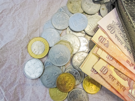 Currency,Coins scattering from the wallet.の写真素材