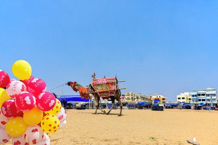 Balloons with love on the beach of Indian Ocean  on a Sunny day at renowned seashore of Puri, Odisha, India,Asia. 12.02.2020.の写真素材