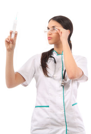 Female doctor holding syringeの写真素材