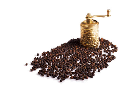 Blck pepper and pepermillの写真素材