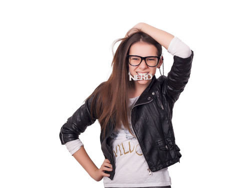 Nerd girl isolated in white の写真素材