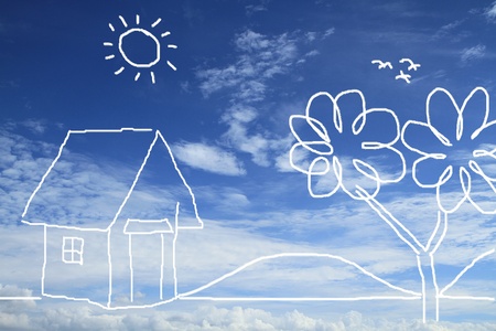 Conceptual of house in nature environment on blue skyの写真素材