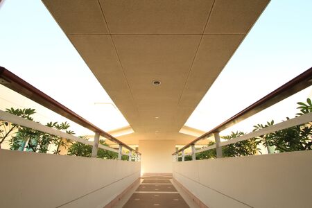 Long corridor between building decorated with beautiful tilesのeditorial素材