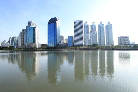 Bangkok city at twilight time with reflection of skyline and building の写真素材