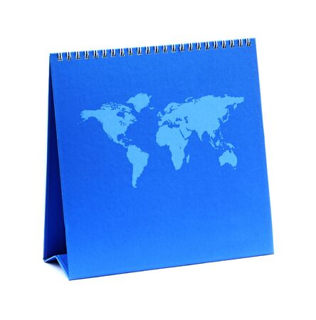 Blank blue calendar with global map isolated on white backgroundの写真素材