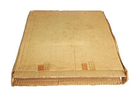 Brown grunge cardboard box isolated on white backgroundの写真素材