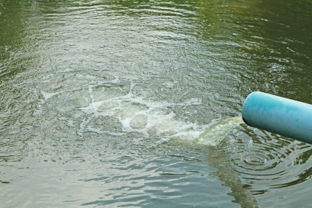 Waste water flow from water pipeの写真素材