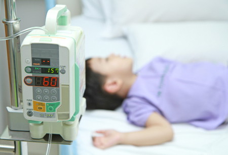 Children patient in hospital bed の写真素材