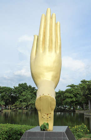 Buddha hand statue in the parkの写真素材