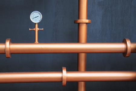 Pressure gauge meter installed on copper pipesの写真素材